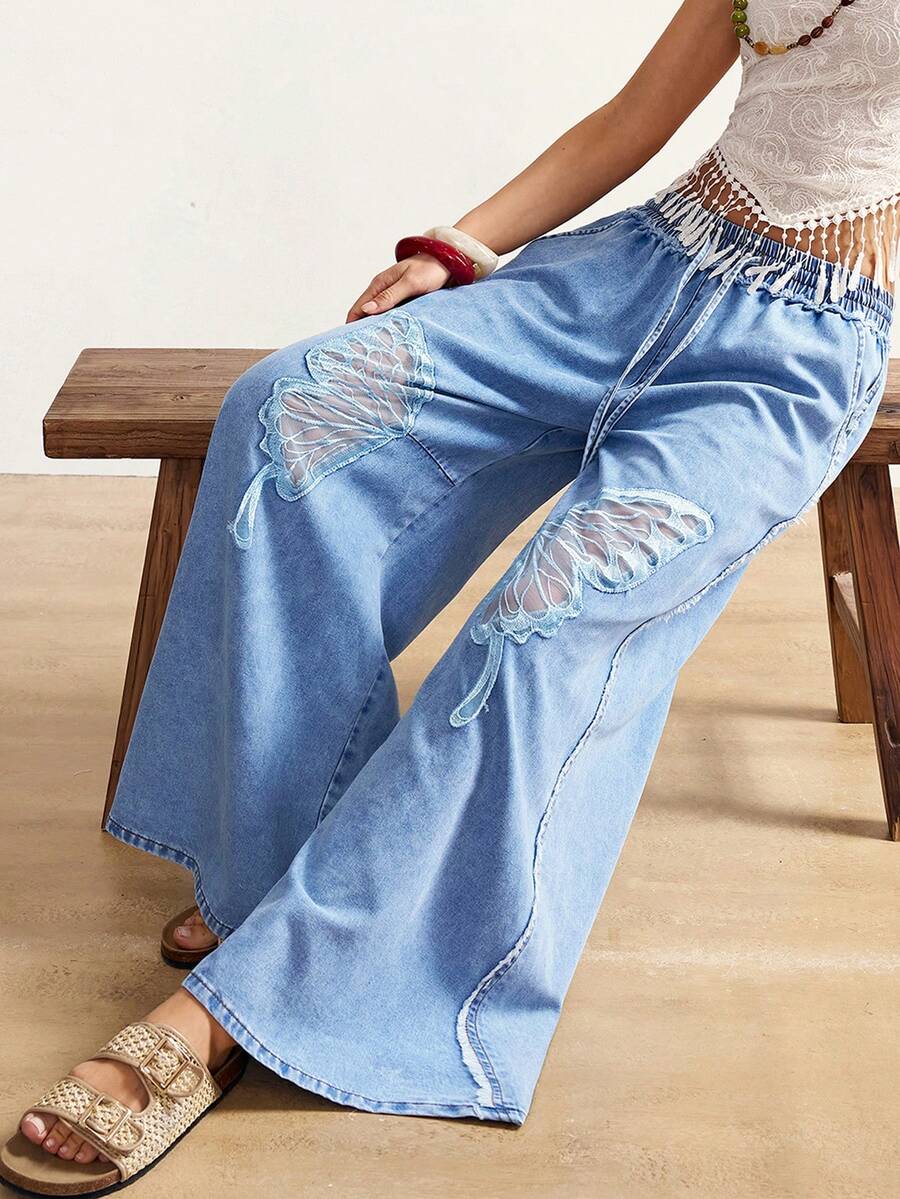 Bohemela Quần jeans nữ cạp cao, ống rộng, co giãn, thiết kế dáng rộng hình bướm và chất liệu vải mỏng nhẹ. Màu xanh nhạt. Thích hợp cho mùa hè, xuân, ngày lễ tình nhân, lễ hội, đi biển, du lịch, mặc thường ngày. - Rửa nhẹ - Xem 1
