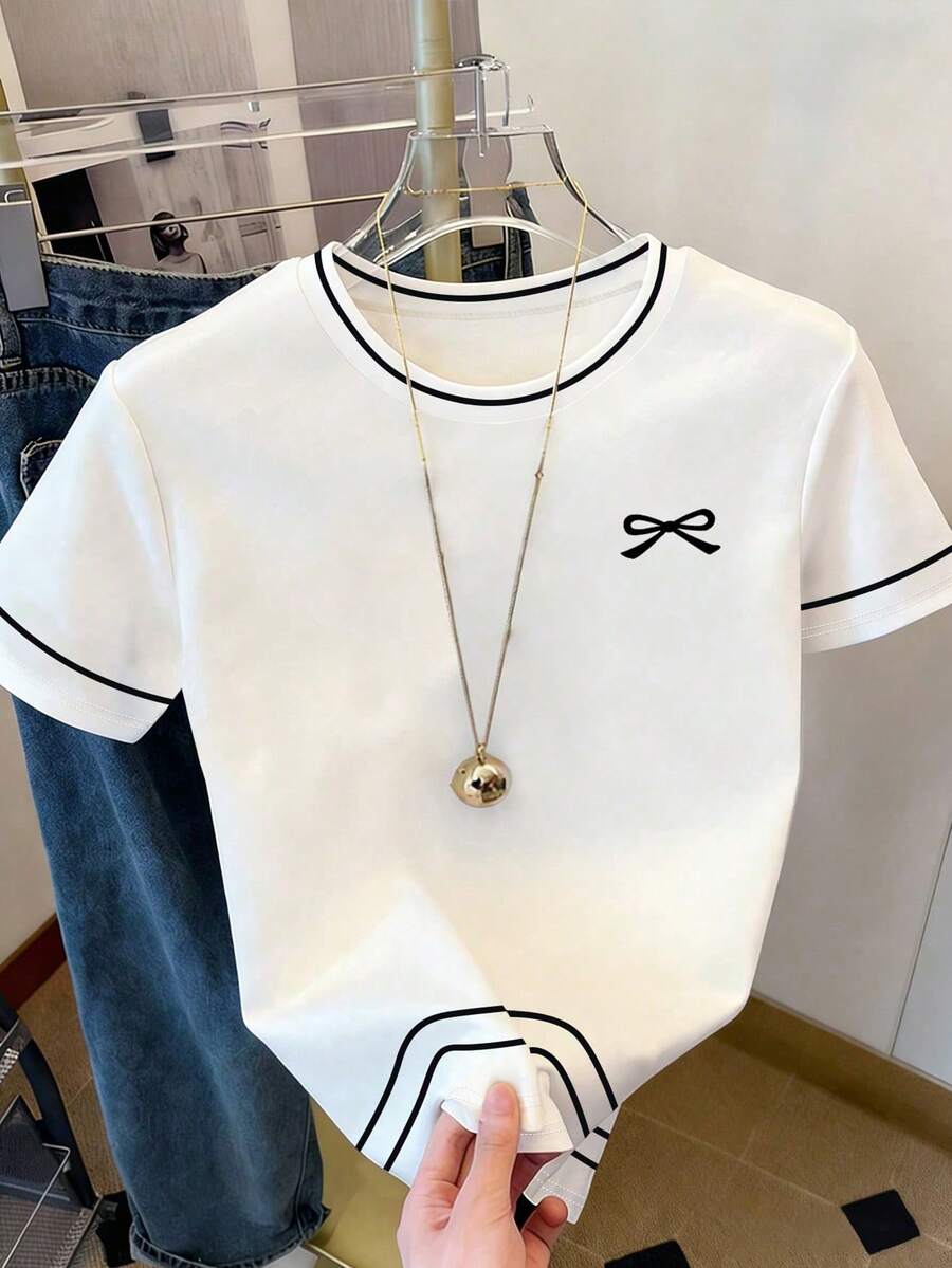 1件少女夏季新款甜美简约蝴蝶结印花上衣，双条纹印花，平面设计，休闲百搭T恤，经典白色，日常穿着，学生装，户外休闲上衣 - 白色 - 查看 1