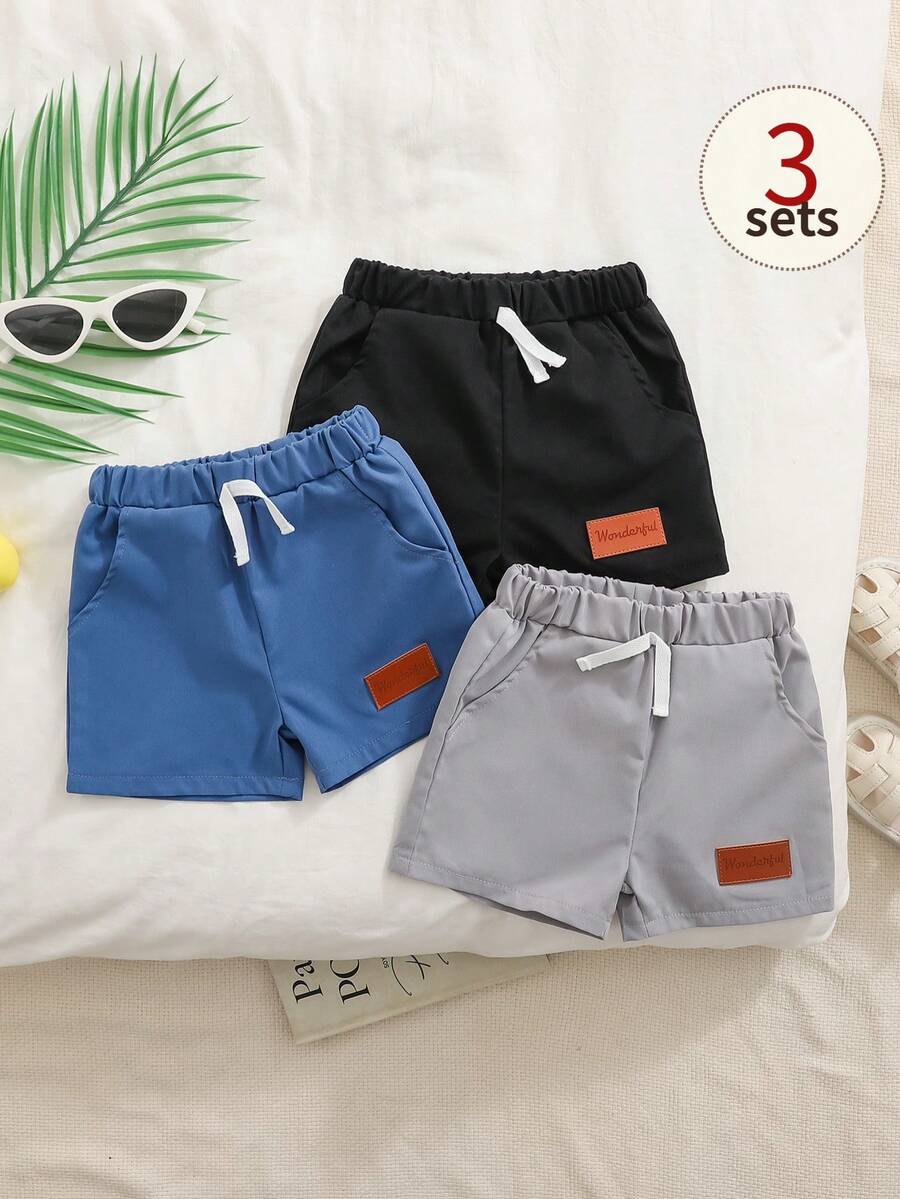 SHEIN Playful Pals 3条装男婴蓝色、灰色、黑色弹力腰休闲短裤,饰有英文字母贴布和假腰带,宽松复古简约风格,带口袋,适合夏季日常外出或运动。 - 彩色 - 查看 1