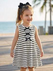 Cozy Pixies Young Girl Striped Pattern Bow Decor Round Neck Sleeveless Waist Cinched Dress Toddler Dress Kids Aline Dress Toddler Girl Cream And Black Dress Kids Casual Sleeveless Dresses Girl Striped Dress - Black - View 1