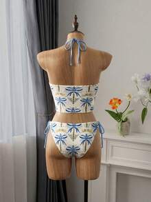 Bellisia 新款女士两件套泳衣，亲肤面料，随机印花露背上衣搭配侧系带泳裤，沙滩度假泳装套装，春夏款 - 淺藍色 - 查看 2