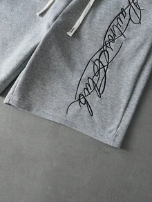 PAVTROS 男士街头风“标志性”手写休闲短裤，松紧腰抽绳设计，针织运动裤，极具辨识度的街头风格，轻便休闲，适合休闲、街头穿搭、时尚、休闲运动、返校、音乐节、情侣装、节日礼物、男友礼物等场合。 - 灰色 - 查看 7