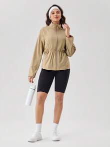 OutZeal Áo khoác nữ ngoài trời màu trơn, kiểu dáng thể thao, chống thấm nước, có dây rút ở eo, cổ đứng, thích hợp cho mùa xuân. - Màu Khaki - Xem 4