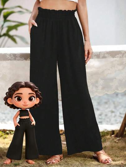 Pantalones de playa casuales de corte holgado y cintura alta para mujer, confeccionados en un tejido ligero, ideales para llevar en la playa.