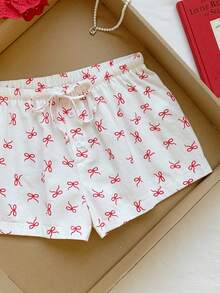 Comfortcana 女士休闲抽绳蝴蝶印花短裤，适合日常通勤和度假，2026年夏季新款春夏时尚女装，适合海滩度假休闲穿着。 - 彩色 - 查看 7