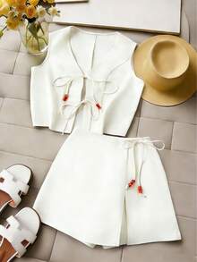 GlowEve Damset med 2 delar, vår/sommar 2026, pärlbandsmönstrad ärmlös linne och shorts - Aprikos - Visa 1