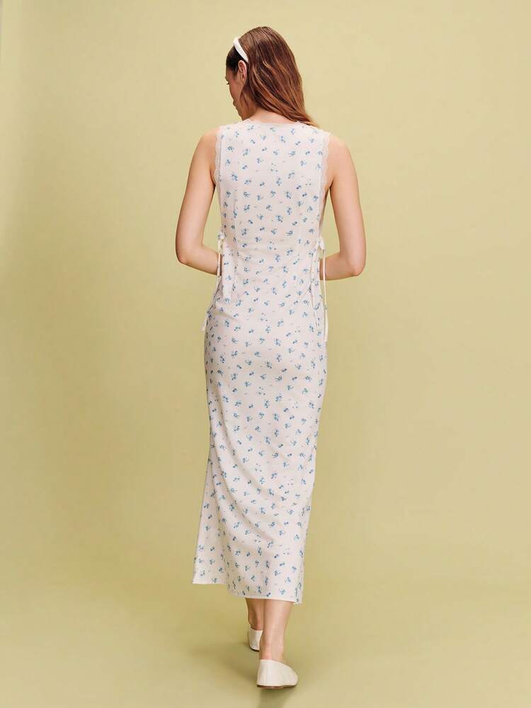 Ecru And Blue Floral Jersey Maxi Dress With A V-Neckline Trimmed In White Lace Spring Summer Vacation Dress French Style Parisian Style Cute Elegant Dress Evening Dress Vintage Holiday Dress Dresses For Woman Summer Floral Print Dress Lace Trim Dress Sleeveless Dress