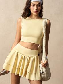VARSIVA Bộ đồ thể thao nữ gồm áo tank top cổ tròn màu trơn và quần váy xếp ly. - Butter Yellow - Xem 5