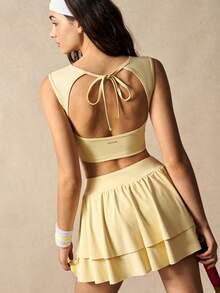 VARSIVA Bộ đồ thể thao nữ gồm áo tank top cổ tròn màu trơn và quần váy xếp ly. - Butter Yellow - Xem 10