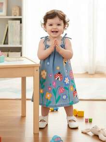Vintaside Kids Đầm denim cho bé gái, màu xanh nhạt, dáng rộng, dây đeo mảnh, in hình bướm, hoa và bọ rùa dễ thương, chất liệu denim cotton nhẹ và mềm mại, là item thời trang không thể thiếu cho các bé gái sành điệu, thích hợp mặc vào mùa xuân/hè, đi chơi, chụp ảnh, dạo phố, dự tiệc, mẫu mới mùa hè 2026. - Rửa nhẹ - Xem 6