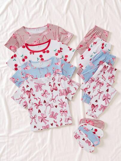 女童蝴蝶结丝带印花休闲两件套，包括圆领短袖上衣和裤子，家居服