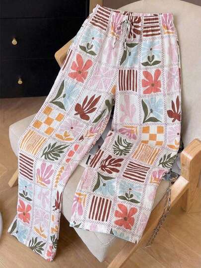 少女花卉拼接印花阔腿裤 - 鲜艳的花卉印花，弹性腰带休闲裤，专为少女设计。采用轻盈舒适的褶皱面料，饰以艺术植物和几何图案，宽松版型，适合日常穿着、上学和休闲聚会。
