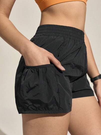 Exploreva Women's Solid Color Elastic Waist Pocket Outdoor Shorts