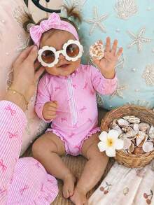 SHEIN Traje de baño de una pieza con cremallera frontal a media, volantes en el bajo y gorro de natación, con estampado de rayas y lazo, estilo vacaciones en la playa para bebés recién nacidos - Rosa - Ver 7