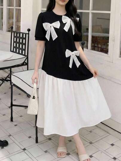 Teen Girl Black And White Patchwork Dress Precisely Captures The Sweet And Cool Girl's Heart: The Black Base + Lace Bow Brings A Vintage And Refined Feel, The Puff Sleeves Minimize The Shoulder Line For A Soft Look, And The Contrasting Skirt Hem Creates A Lightweight And Silhouette. The Relaxed Fit Is Not Limited To Any Body Type, And The Thoughtful Details Elevate This Basic Piece Beyond Making It A Versatile Item That Balances Style And Practicality.