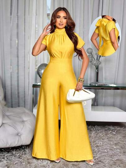 SOLERSUN Spring/Summer Women's Solid Color Elegant Party Jumpsuit, Simple Commuter Style, Suitable For Birthday Parties, Daily Casual Wear, Wedding Season, Back To School Season, Thanksgiving, Graduation Season. Features: Stand Collar, Tie-Waist, Pleated, High-Waisted Jumpsuit. Yellow Jumpsuit, Summer Outfit.