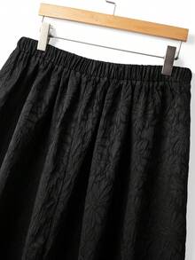 GlowEve CURVE 大码女式花卉提花简约A字裙，优雅休闲，适合办公室通勤和度假穿着 - 黑色 - 查看 6