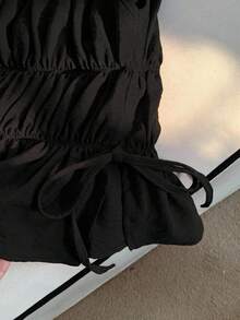 Comfortcana Camiseta sin espalda de color rojo sólido para mujer de talla grande, con lazo lateral, adecuada para usar en la calle y de vacaciones - Negro - Ver 4