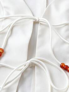 GlowEve Damset med 2 delar, vår/sommar 2026, pärlbandsmönstrad ärmlös linne och shorts - Aprikos - Visa 6