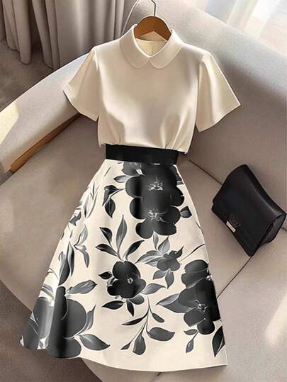 Franclia Women's Elegant Peter Pan Collar Short Sleeve Blouse & Printed Skirt 2 Pieces Set Elegant Floral Dresses For Women Black And White Dress Women Elegant Elegant Spring Dress Skirt Set Two Piece Elegant Elegant Midi Dress Elegant Dress For Women Women Elegant Outfits Women Floral Dress New Arrival Womens Dress High Quality Dress