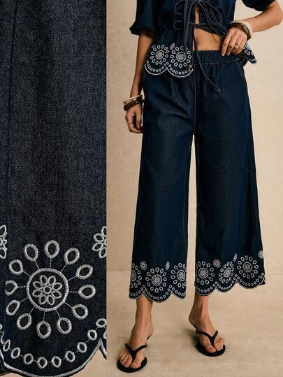 Poéselle Jeans casuales y versátiles de pierna ancha con cintura elástica y bordado floral para mujer