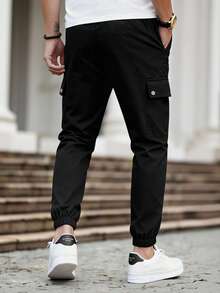 Manfinity Homme 男士成熟休闲多口袋工装裤，适合日常休闲穿着、周末外出、旅行、与朋友聚会等场合。这款裤子是男士衣橱中不可或缺的百搭单品，也是送给男友或丈夫的绝佳礼物。 - 黑色 - 查看 2