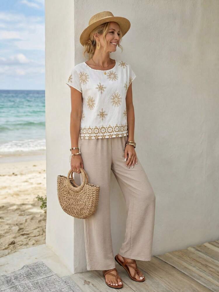 2pcs Women Graphic Print Round Neck Short Sleeve Top And Solid Color Pocket Long Pants Set Boho