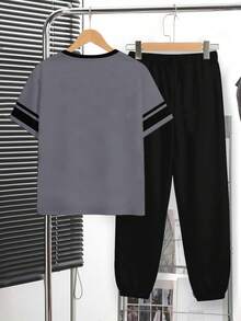 SHEIN Bộ đồ thể thao tối giản tay ngắn cổ tròn cho bé trai tuổi teen, gồm áo thun và quần, thích hợp cho mùa hè. - Nhiều màu - Xem 3