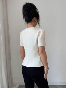 Selianne Chemise à manches courtes plissée à boutons, couleur unie, à la mode et polyvalente pour femme, idéale au quotidien. - Nude - Voir 2