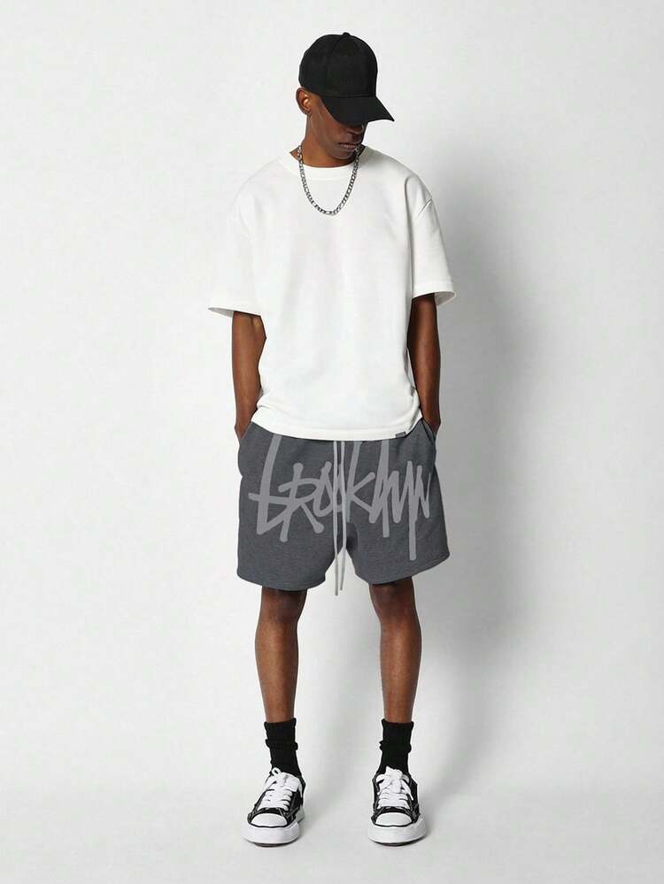Printed Drop Crotch Shorts With Graffiti Text