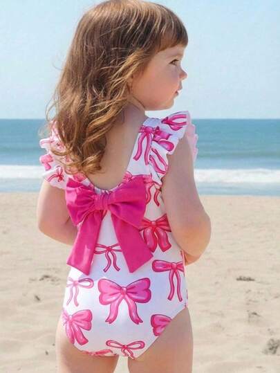 SHEIN 女婴可爱蝴蝶结印花休闲针织荷叶袖撞色连体泳衣，夏季女婴可爱针织蝴蝶结拼接撞色吊带连体泳衣，适合夏季外出、游泳、海滩度假