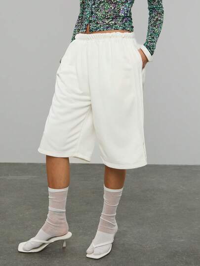 COUREZ Low Rise Longline Jersey Shorts /Y2K Spring Clothes For Women White Shorts Mid Length Shorts Loose Fit Street Streetwear Casual Going Out Clothes Vacation Outfits Holiday Outfits Summer Festival Outfits Summer Holiday