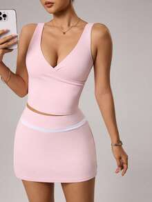 Dewbera Women's Spring/Summer Sports Set, Includes: Pink Cross V-Neck Regular Length Fitted Sports Top, Contrast Waistband A-Line Sports Skirt With Shorts Lining And Pockets, Suitable For Casual Wear, Running, Yoga, Gym, Tennis, Golf - Pink - View 8