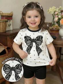 SHEIN 女婴两件套休闲套装，花卉蕾丝蝴蝶结印花圆领短袖T恤搭配黑色短裤，适合春夏季节、休闲穿着、户外、上学等场合。 - 彩色 - 查看 6