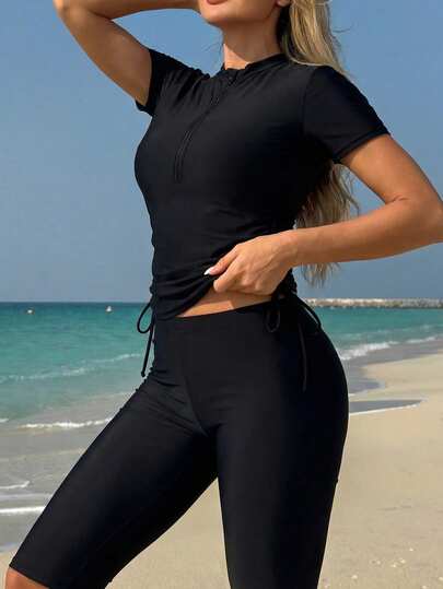 Swim Shayni Bộ đồ bơi Burkini màu đen trơn, tay ngắn xếp ly và quần short, kiểu dáng mới, dành cho phụ nữ trẻ trung, sành điệu.