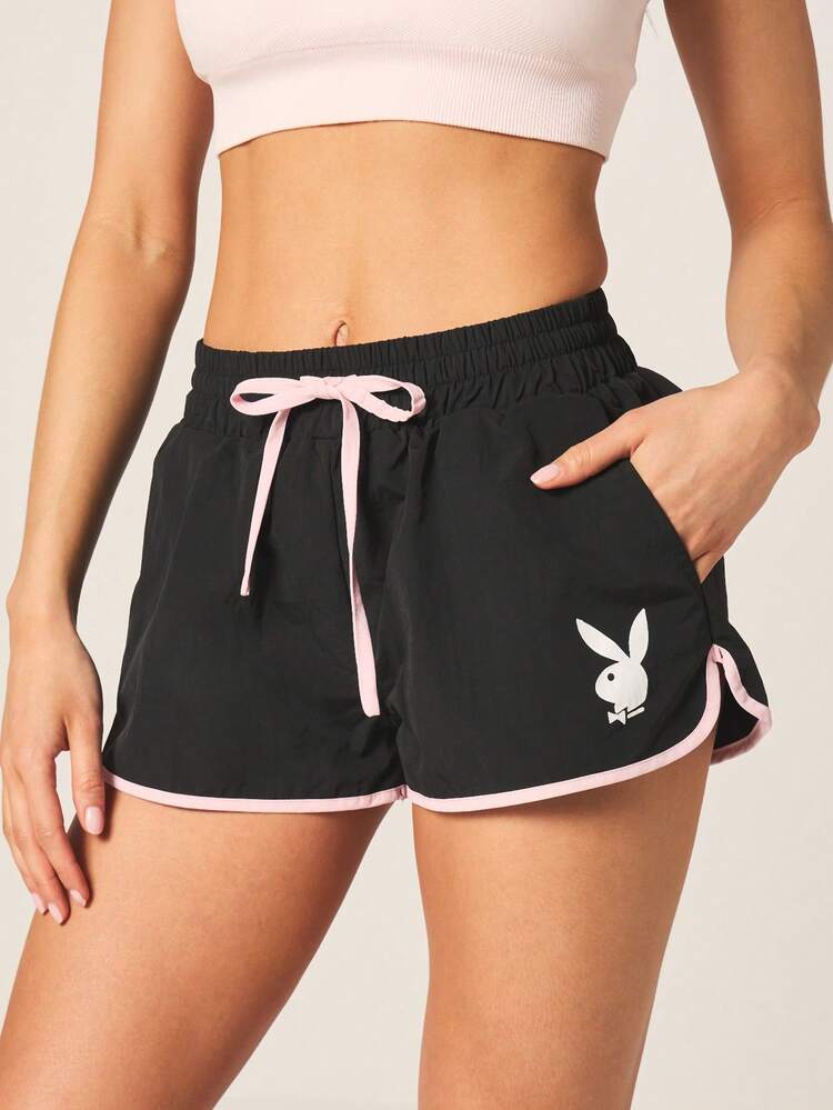 Missguided x Playboy Damen Bunny Logo Zugband Athletik Shorts mit kontrastierendem rosa Saum und Seitentaschen für einen aktiven Lebensstil