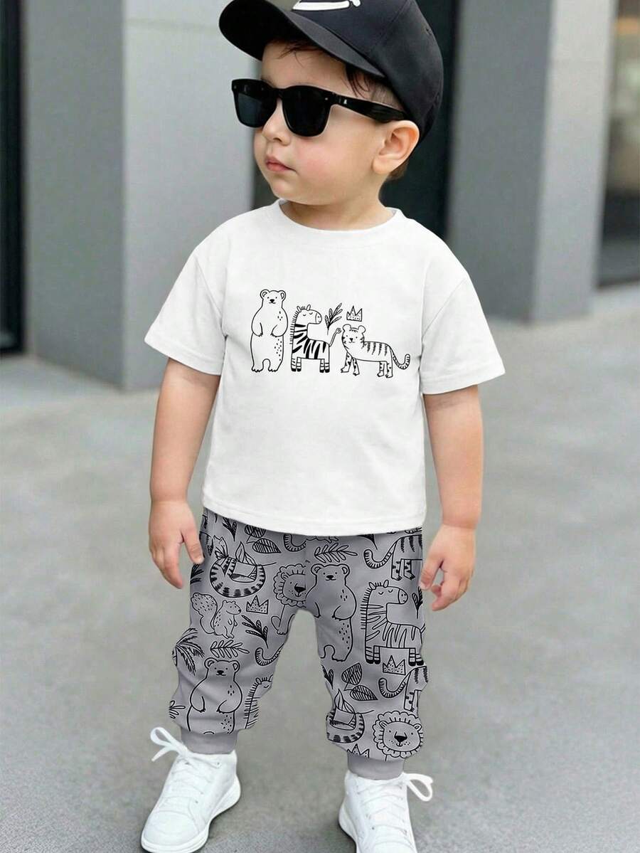 Bubblio 男婴休闲宽松舒适短袖T恤和裤子套装（2件套），适合春夏穿着，经典可爱印花图案包括斑马、老虎、棕熊、狮子、松鼠、河马、大象等卡通动物。 - 彩色 - 查看 1