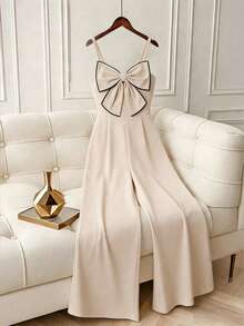 SHEIN Textured Fabric Spaghetti Strap Jumpsuit, French Bow Design, Unique Aesthetic, Fashionable, Draping, Snug Fit, Straight-Leg Jumpsuit For Spring/Summer - Apricot - View 1