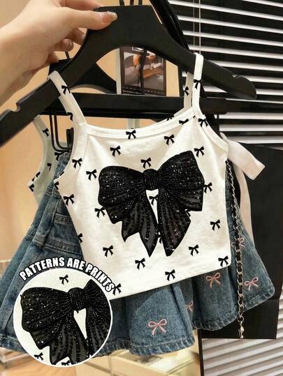SHEIN Cute Ballet Style Mini Bow Print, Black Elegant Delicate Bow Print Pattern, Chic, Young Girl Casual Minimalist Camisole Suitable For Summer, Cute Summer Outfits For Outing, Summer Kids Items, Summer Outing Items, Korean Style, Homecoming, Easy Comfort & Stylish Kids, Spring & Summer Outfits For Outing, Casual Wear, Baby & Kids Graphic Tops, Summer New Style, Spring & Summer Fashion