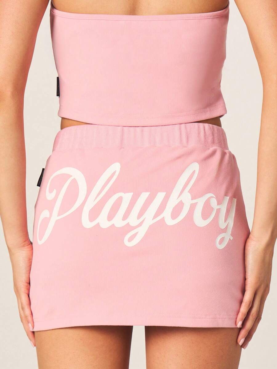 Missguided x Playboy Chân váy ngắn màu hồng với chi tiết dây buộc có logo chữ, cạp cao, chất liệu gân, kiểu dáng thường ngày, thích hợp cho mùa hè. - Hồng - Xem 1
