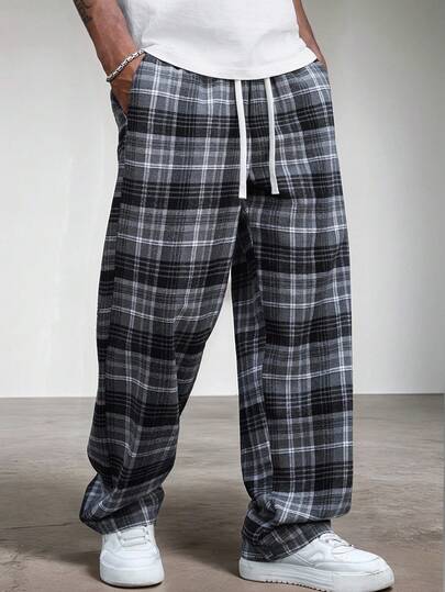 Manfinity Hypemode 时尚男士黑白格子阔腿裤，带口袋，舒适梭织面料，长裤款式，休闲外出完美之选。格子裤，男士原宿风，棕色格子裤，男士街头风，男士宽松格子裤，男士超大格子裤，男士家居裤，男士睡裤。适合日常休闲、周末旅行、户外活动、探险旅行、轻松的工作环境或半正式场合，也是送给男友/丈夫、周年纪念/生日礼物或夏季派对的理想之选。