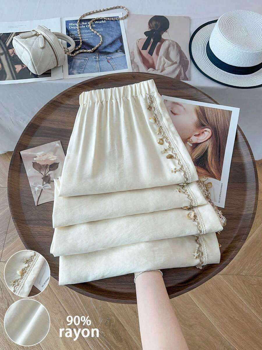 GlowEve CURVE 2026春夏大码女式休闲度假沙滩贝壳织带凉爽面料阔腿裤 - 杏色 - 查看 1