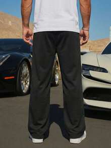 Manfinity Homme Pantalones casuales versátiles para hombres con estampado de letras y cintura con cordón - Negro - Ver 2