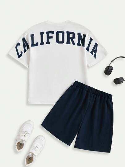 2pcs/Set Big Boys' White Round Neck Short Sleeve CA Logo Print Casual T-Shirt And Navy Blue Mid-Waist Pocket Shorts