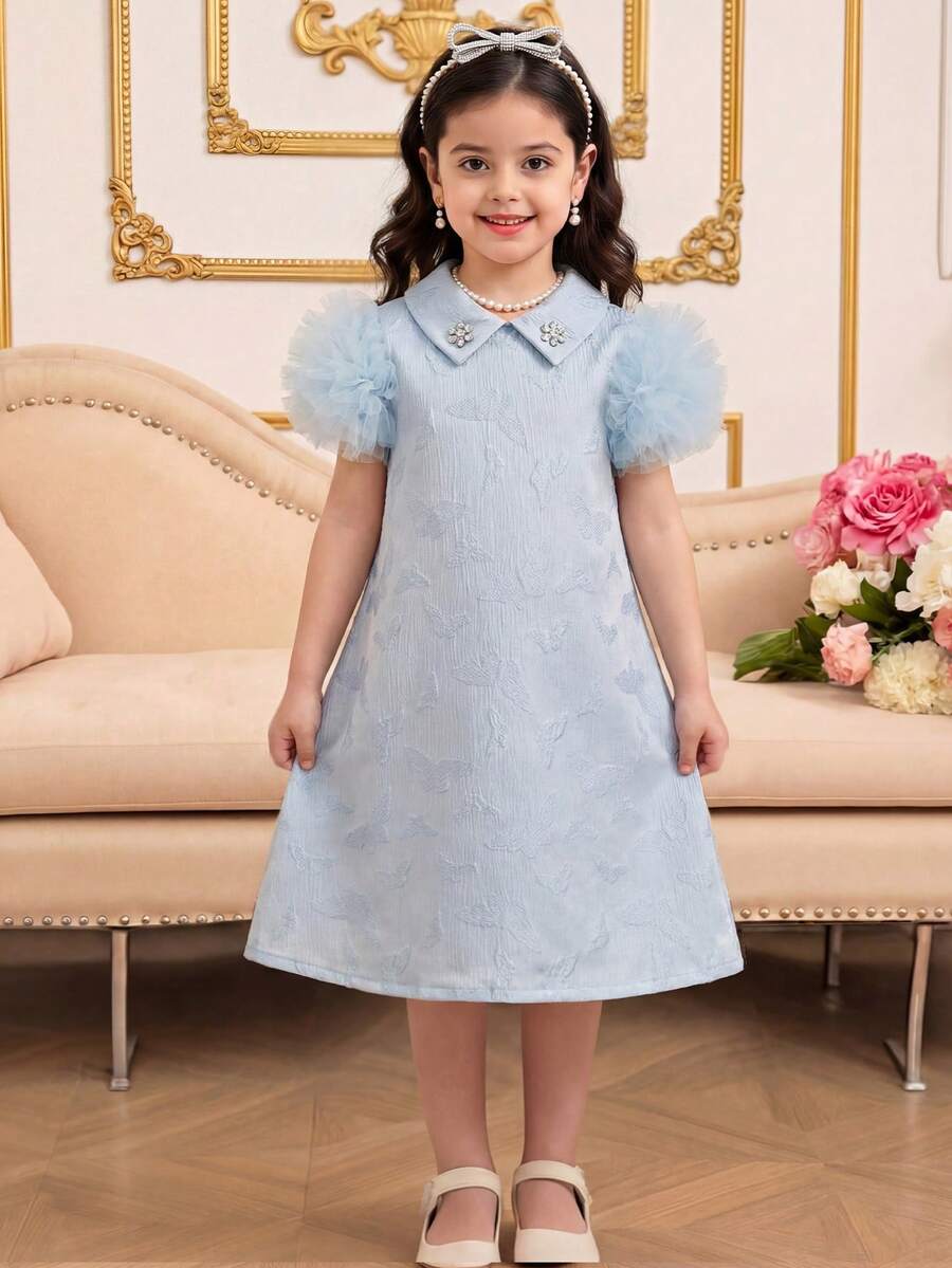 SHEIN Đầm mini dáng rộng màu xanh dương tay phồng cổ tròn họa tiết hoa, chất liệu mềm mại, co giãn, thích hợp cho kỳ nghỉ hè 2026, dành cho bé gái. - Màu xanh lam - Xem 1