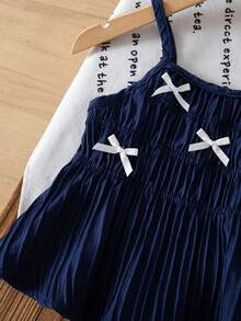 女童夏季两件套：藏蓝色褶皱吊带背心，饰有白色蝴蝶结，搭配蓝白格子阔腿裤，清新甜美，宽松舒适，时尚休闲的儿童夏季服装。 - 寶藍色 - 查看 7