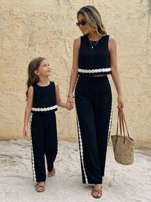 SHEIN Bộ đồ thể thao thường ngày cho bé gái tuổi teen, màu đen, cổ tròn, không tay, viền gấu, gồm áo ôm sát và quần ống rộng suông, 2 món. - màu đen - Xem 4