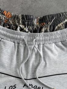 PAVTROS Men's Letter Print Drawstring Waist Pocket Casual Shorts - Grey - View 6