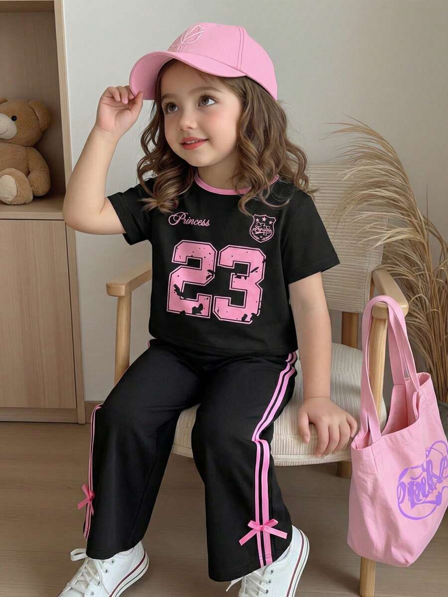 SHEIN 女婴夏季两件套套装 - 圆领短袖黑色上衣，印有英文数字，豹纹宽松裤，饰有蝴蝶结，适合2岁女童，男女宝宝套装，配套服装，街头风女童装 - 彩色 - 查看 1