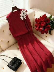 Franclia Conjunto feminino de duas peças para outono/inverno, composto por colete de tricô sem mangas com estampa floral e gola redonda, combinado com saia midi de tricô cinza floral em formato A. - Vermelho - Ver 7